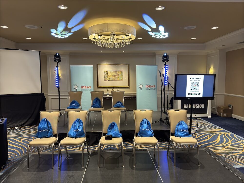 DJ Illusion Essential corporate package with two lighting totems and haze at a company party